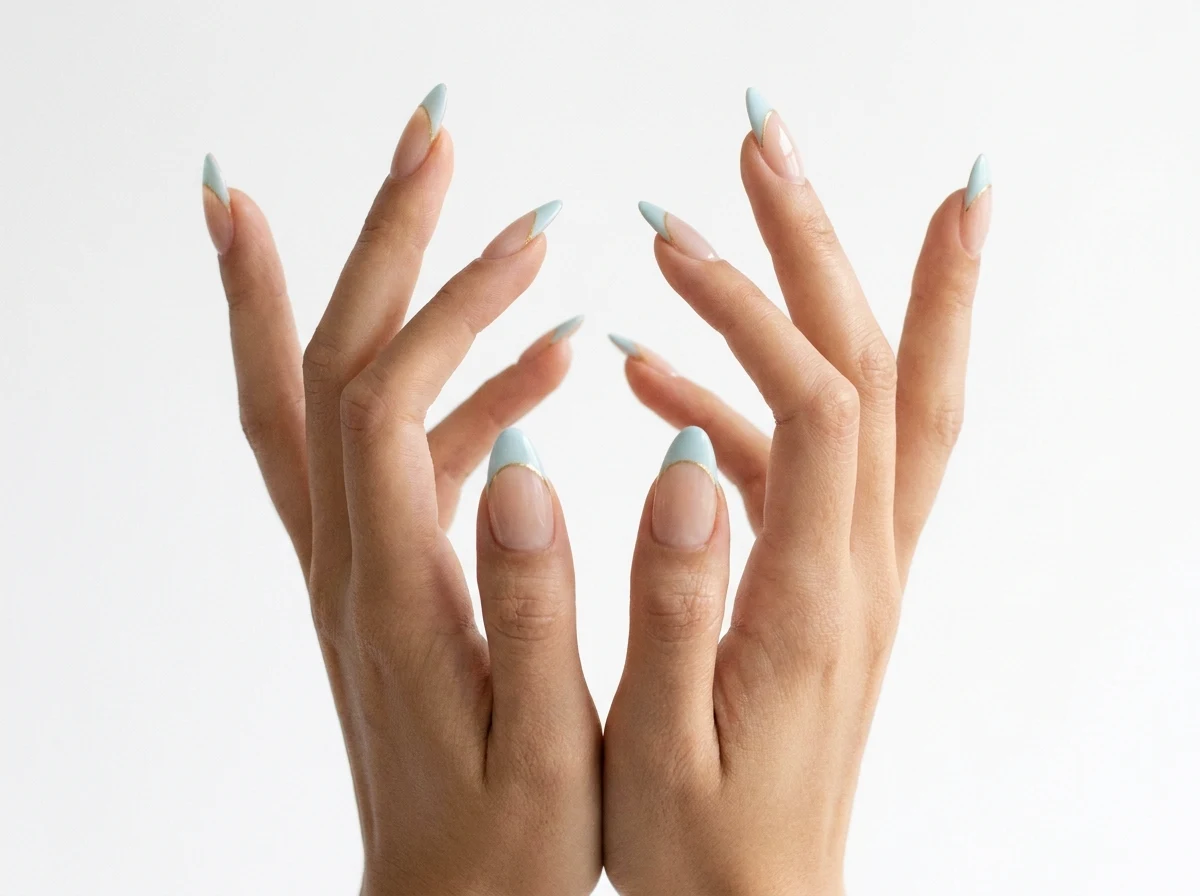 7. Pastel Blue French Tips with a Sporty Twist